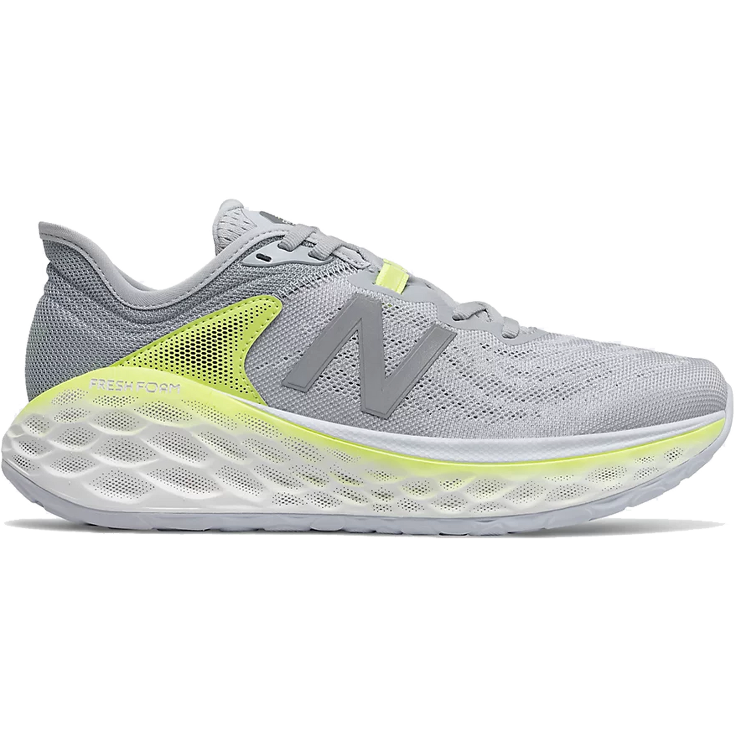 Women's New Balance More V2 running shoe. Upper in the colour grey and fresh foam sole is white with some lime colouring.  