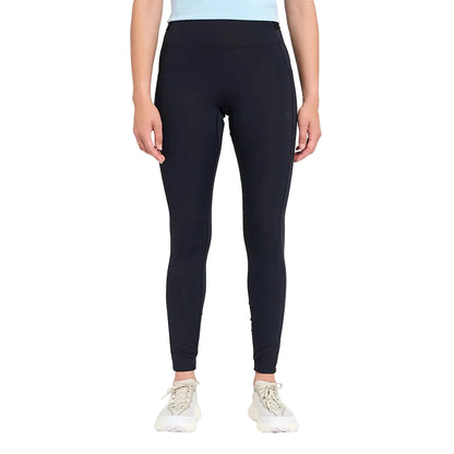 Person wearing black leggings on a white background