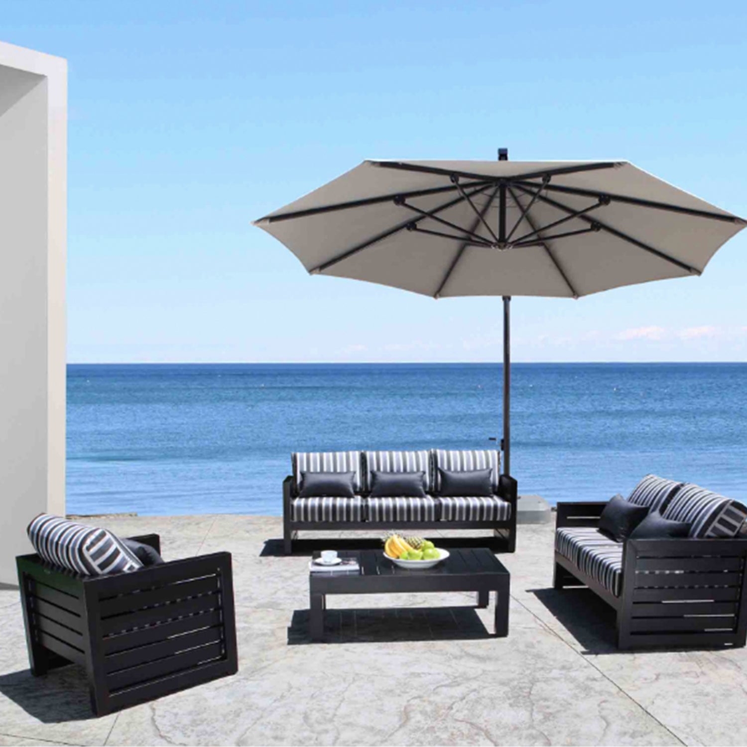 Patio furniture set with sofa, 2 chairs, and an cantilever umbrella