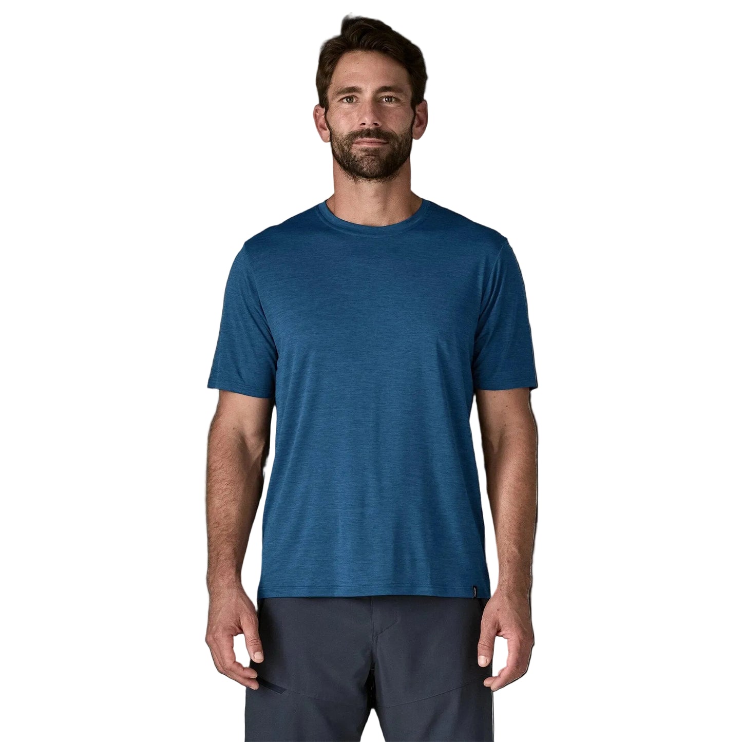 Man wearing a blue t-shirt against a plain background